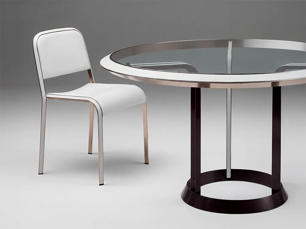 Poltroncina Nota e tavolo coordinato Accordo per Poltrona Frau, trafilato metallico con rivestimento in pelle, 1985
