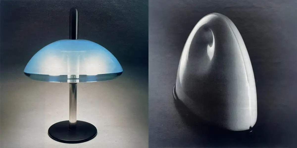 Lampada da tavolo Gliss con cupola azzurra su stelo e, accanto, lampada Ialea a forma di guscio bianco, iGuzzini illuminazione